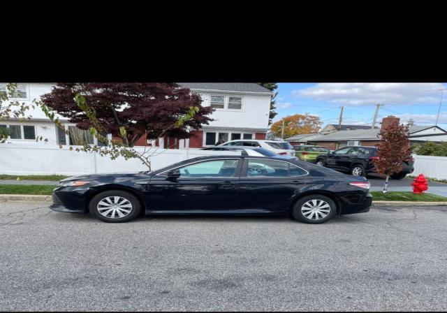 TLC Car Market - 2019 Toyota Camry Hybrid For Rent $450